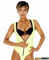 Keri Hilson Accentuates Her Yummy Round Tits By Oiling Them Up For A