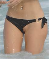 here is maria menounos having a major bikini malfunction pussy slip in ...