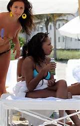 Sanaa Lathan showing her tits and ass in thong on beach paparazzi ...