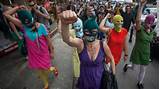punk band Pussy Riot wear masks and tape their mouths during a protest ...