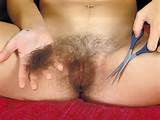 Cute blonde girl shaving hairy pussy