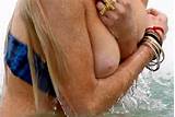 Lindsay Lohan Tit Out Swimming Pics