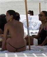 Sanaa Lathan showing her tits and ass in thong on beach paparazzi ...