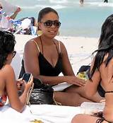 Sanaa Lathan showing her tits and ass in thong on beach paparazzi ...