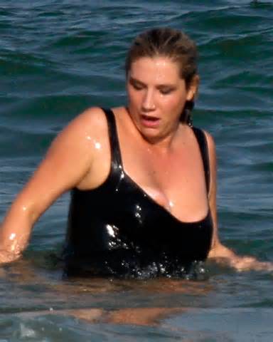 ... the thumbnails below for the larger versions of Ke$haâ€™s boob slip