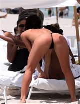 Sanaa Lathan showing her tits and ass in thong on beach paparazzi ...