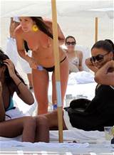 Sanaa Lathan showing her tits and ass in thong on beach paparazzi ...