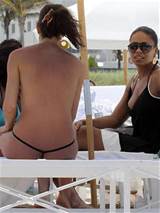 Sanaa Lathan showing her tits and ass in thong on beach paparazzi ...