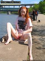 naughty redhead flashes her pussy in public and put a toy in her pussy