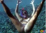 Creative hottie flashing her pierced pussy while scuba diving