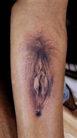 vagina forearm tattoo