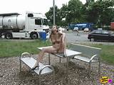 Naughty MILF nude at truck stop - NakedOnTheStreets.com