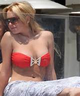 Celebrity Lindsay Lohan excellent upskirt pussy shots