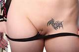goth plays with her big pierced tits and shows off her shaved pussy ...