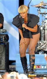 Mary J Blige pulls out a wedgie from her fat, hungry black ass at the ...