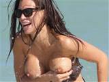 Claudia Galanti in bikini boob slip nip slip in Miami