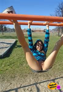 Flashing pussy at the playground - NakedOnTheStreets.com