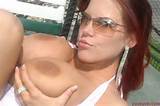 Rebecca is a hot redhead with big set of juggs. She poured some lube ...