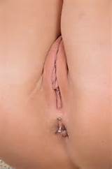lickitgemini:Pussy piercing and a guiche as well !!