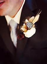 ... dried wheat and dried pussy willow create an attractive lapel