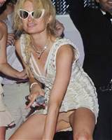 these are real photos of paris hilton intentionally showing her vagina